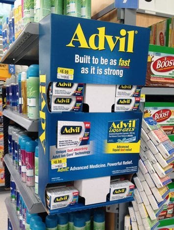 An Advil point-of-purchase display in a store aisle